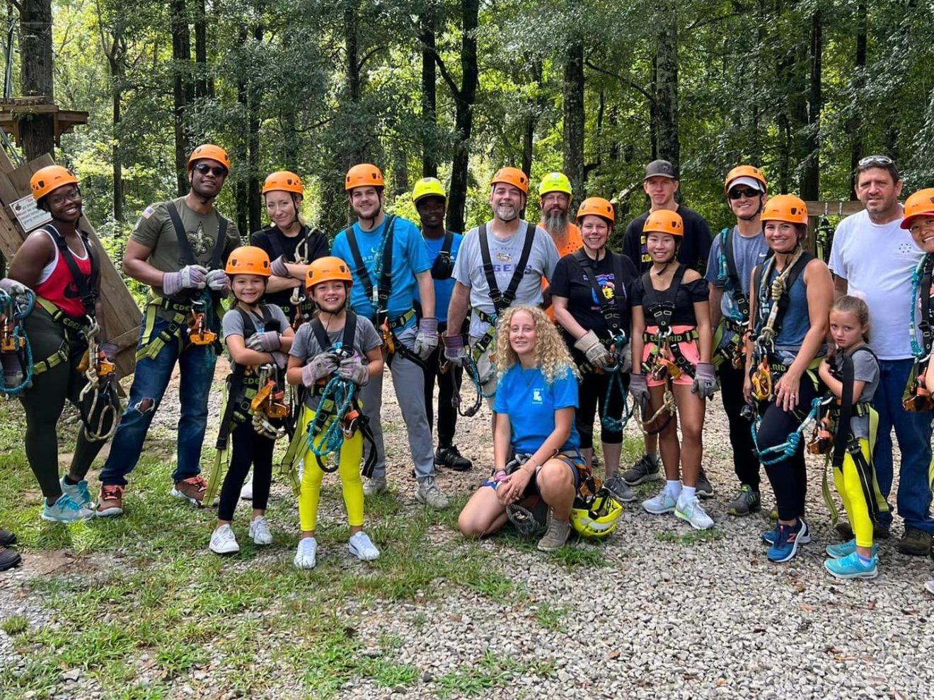 a group of people posing for the camera