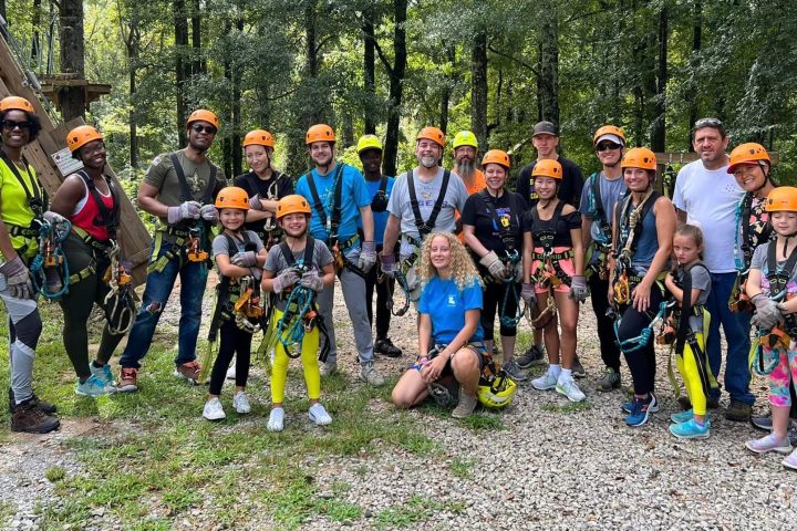 a group of people posing for the camera