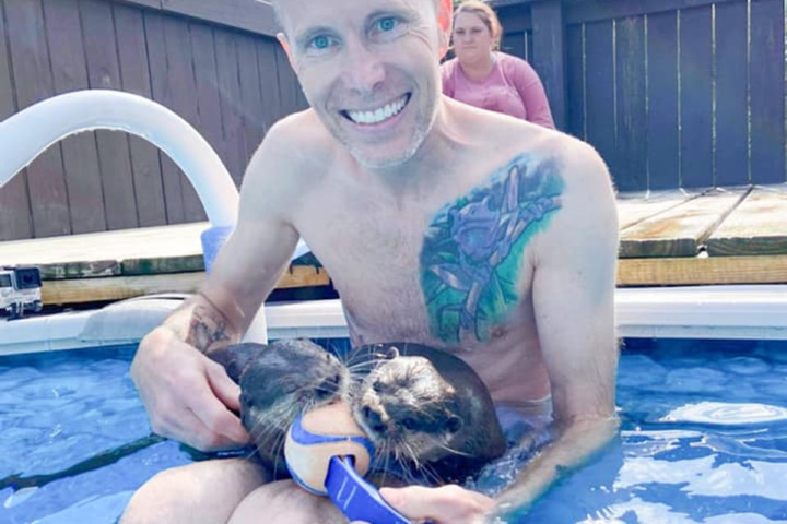 a woman sitting in a swimming pool