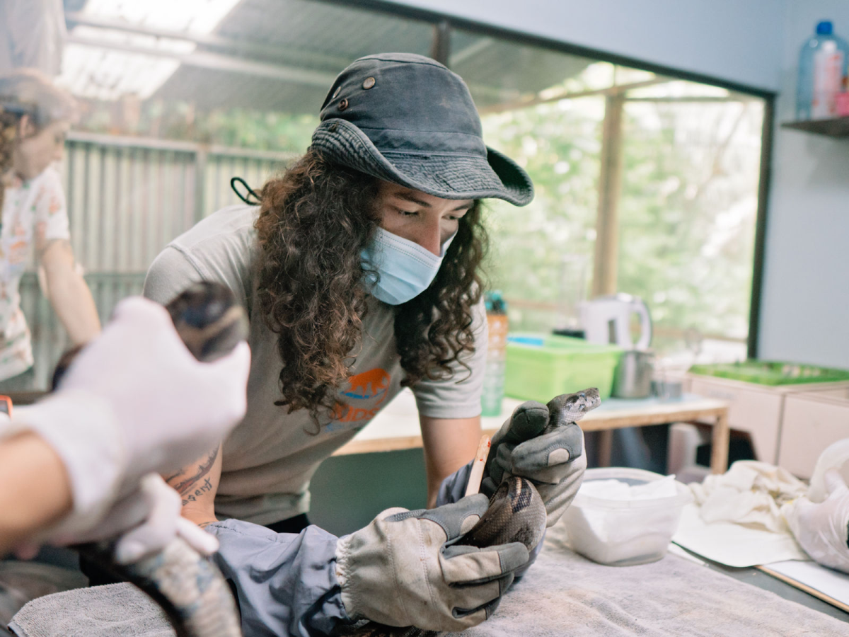 a man and a woman sitting on the floor