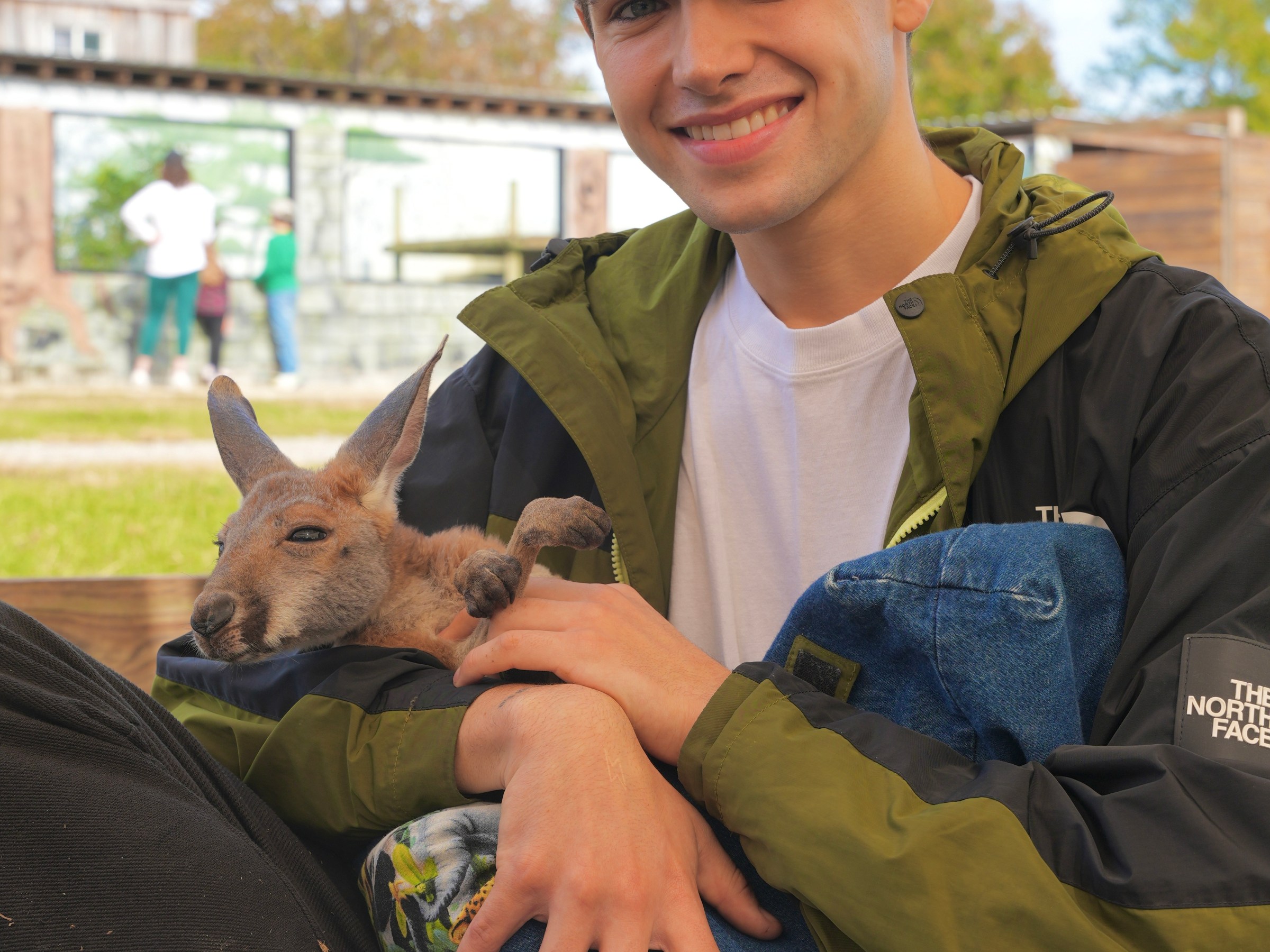man holding kangaroo